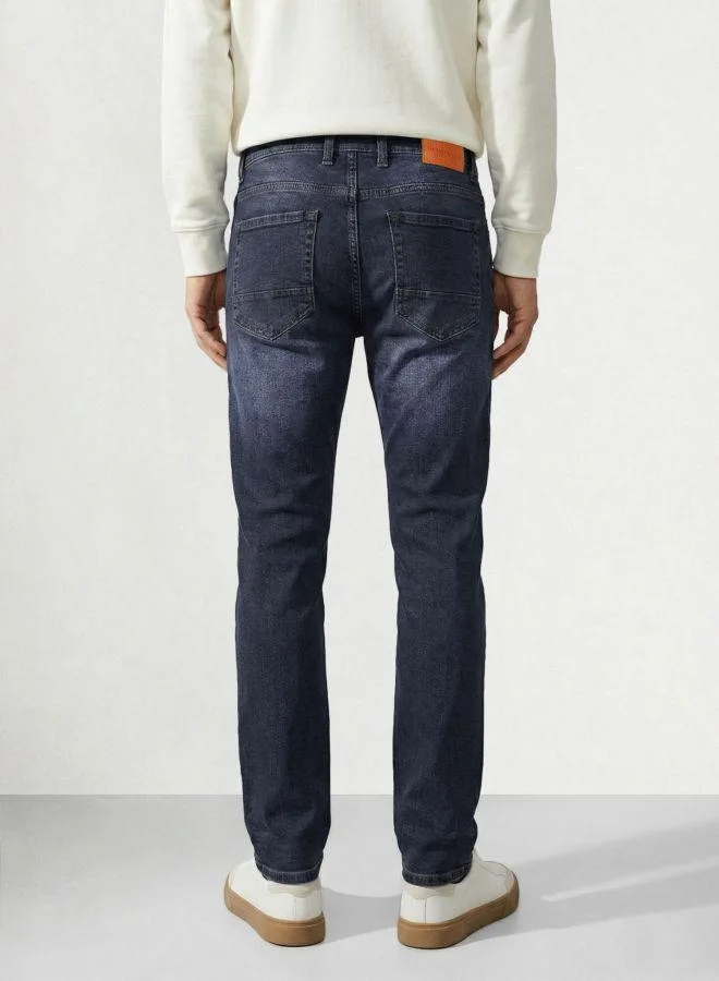 The Indian Garage Co Men Slim Fit Solid Scoop Pocket Mid-Rise Jeans